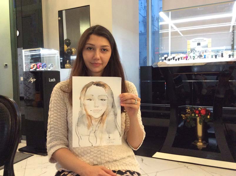 Татевик позирует шаржисту Мишелю в магазине 